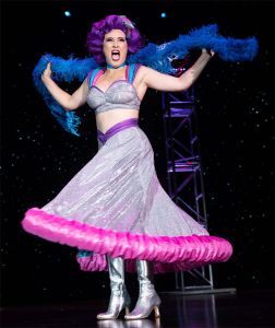 Instructor Margo Mayhem performing her Space Babe act